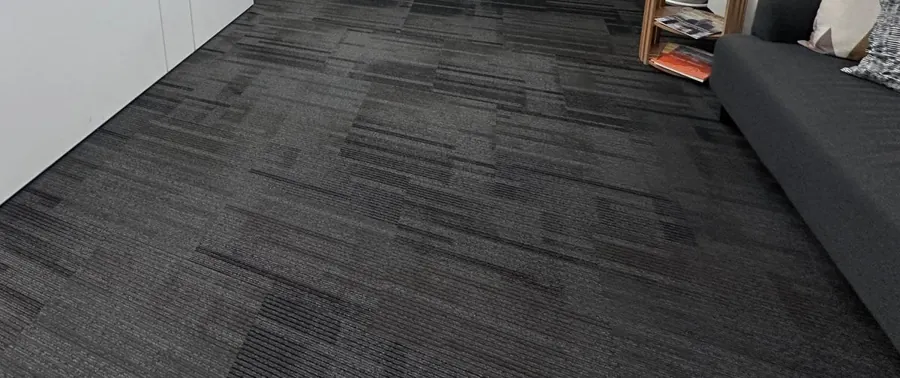 Dark carpet tiles in an office reception