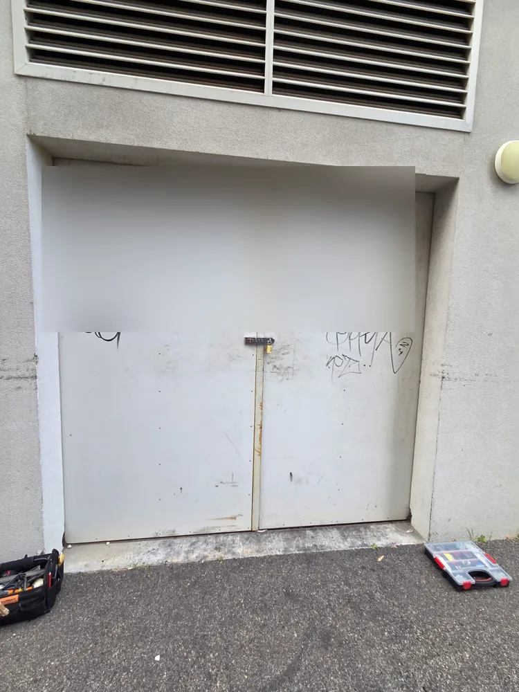Bin store double doors from outside after the new external lock was fitted