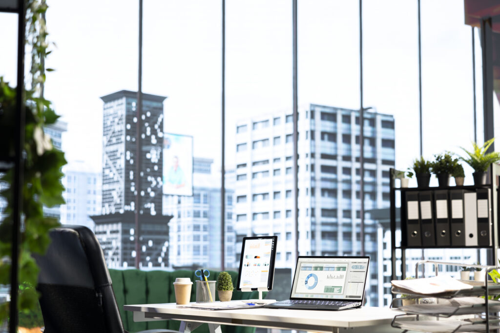 Smart building management dashboard overlay on modern Perth commercial office interior, 2026.
